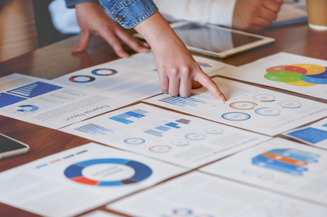 photo of different information graphics on table
